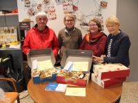 Remise des colis de Noël au local du Comité de quartier Pasteur